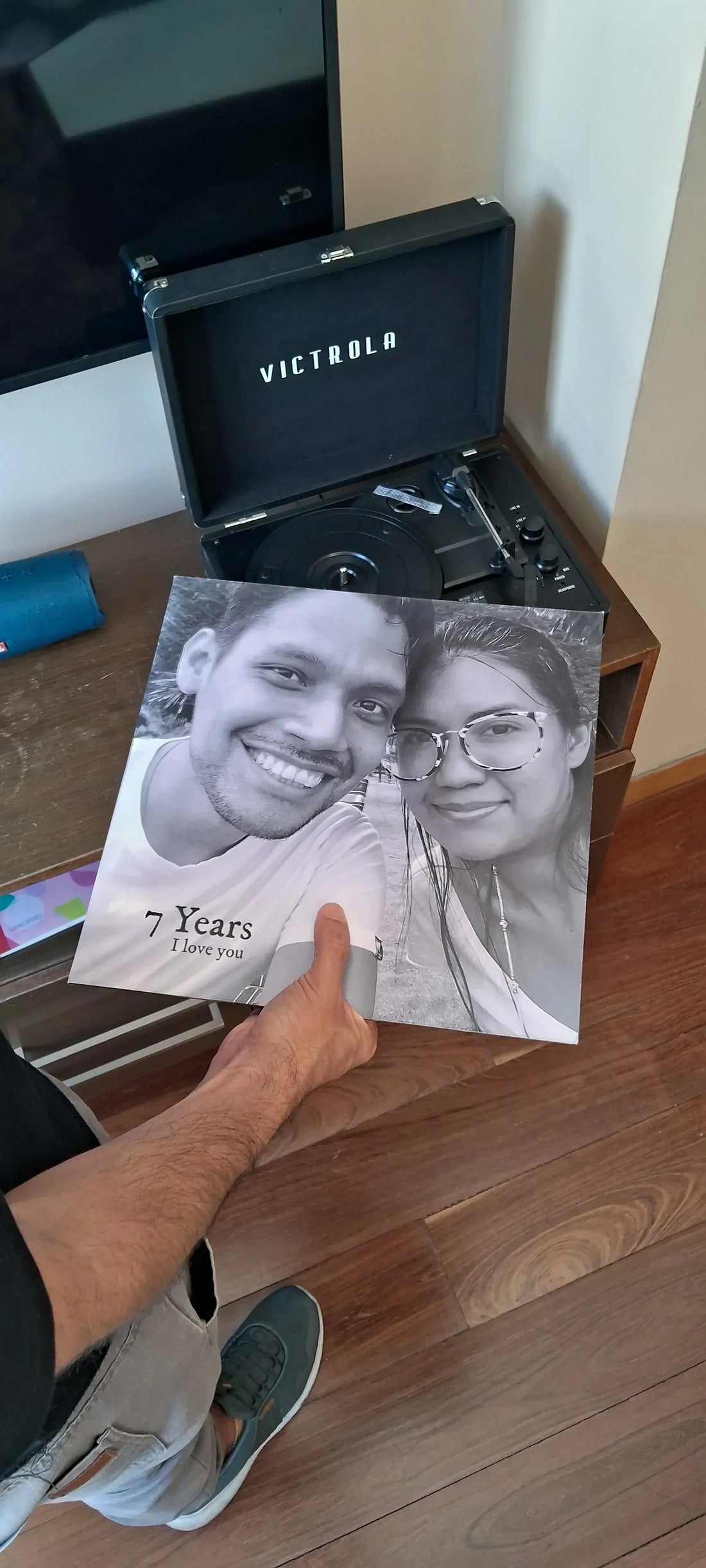 This is our 7th anniversary keepsake, and we made a custom vinyl record to celebrate it.