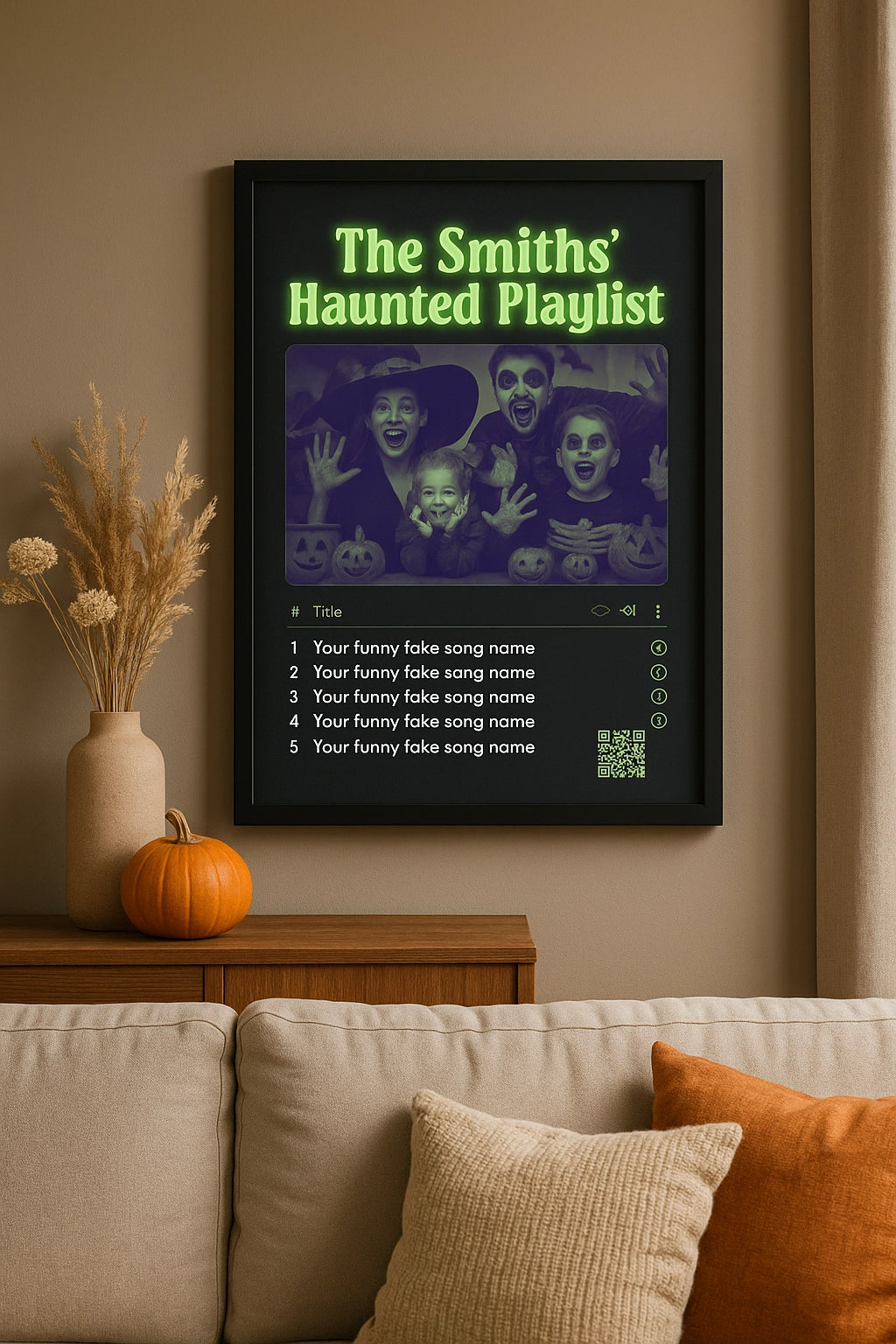 Printable Halloween wall art with playlist QR framed in a cozy living room.