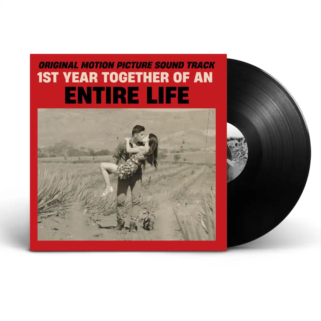 Custom anniversary vinyl record with personalized photo jacket, the perfect 1st year paper anniversary gift featuring your special song.