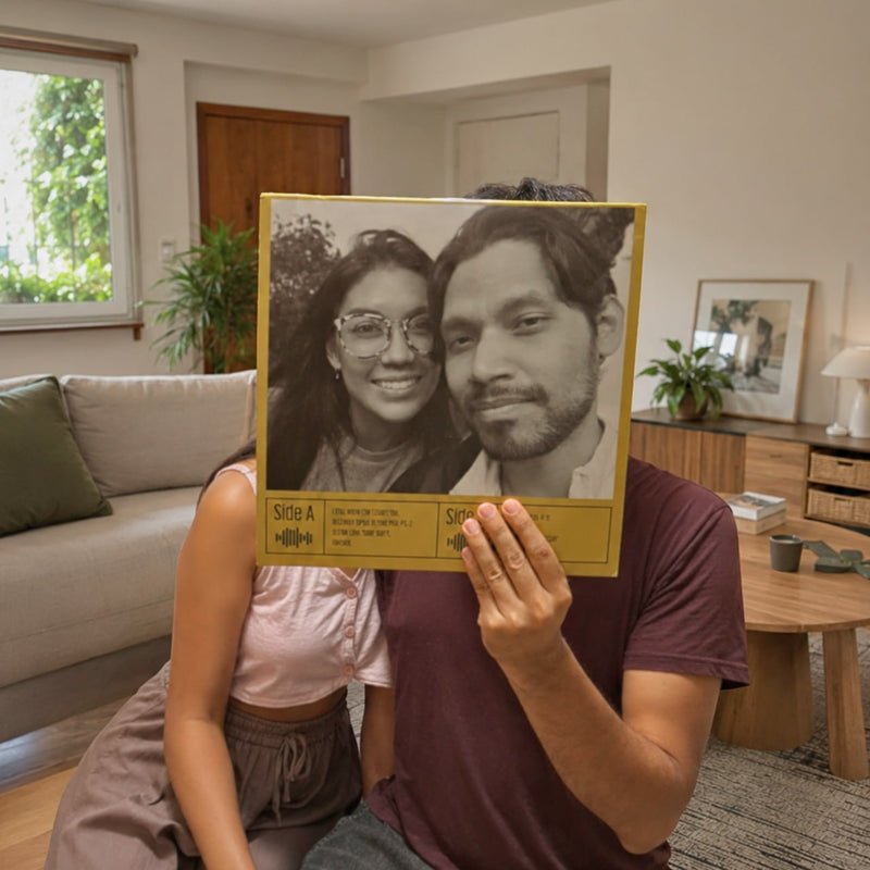 Henry and Yayi, founders of CCS Vintage, handling a custom vinyl record