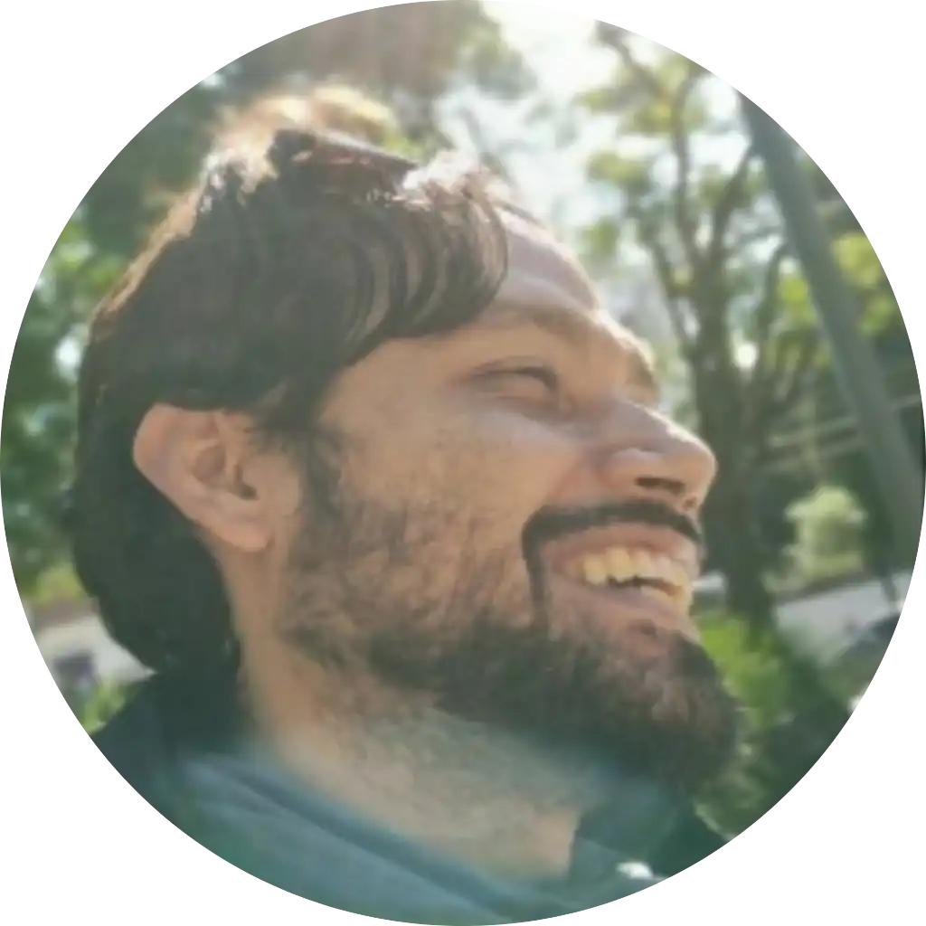 Portrait of Henry, co-founder of CCS Vintage. He is the expert managing production logistics and operations for custom vinyl record orders.