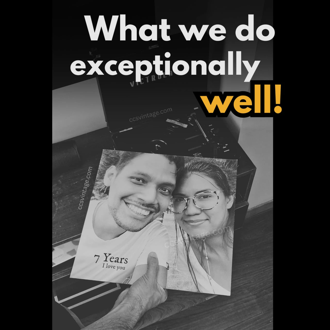 A hand holding a personalized anniversary vinyl record featuring a black and white photo of a smiling couple and the text '7 Years I love you', showcased next to a turntable to represent the unique, one-of-a-kind musical gifts created by CCS Vintage.