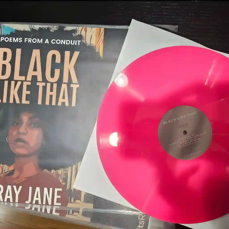 A vibrant hot pink personalized vinyl record paired with a custom-printed indie artist jacket, illustrating professional results for short-run music projects.