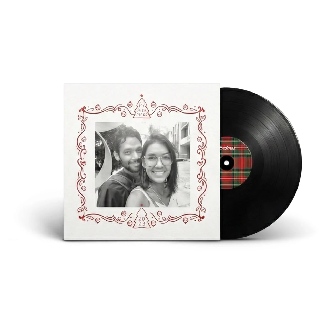 A finished personalized Christmas vinyl record with a couple's photo cover, serving as a visual example for our step-by-step guide on how to make a custom vinyl record.