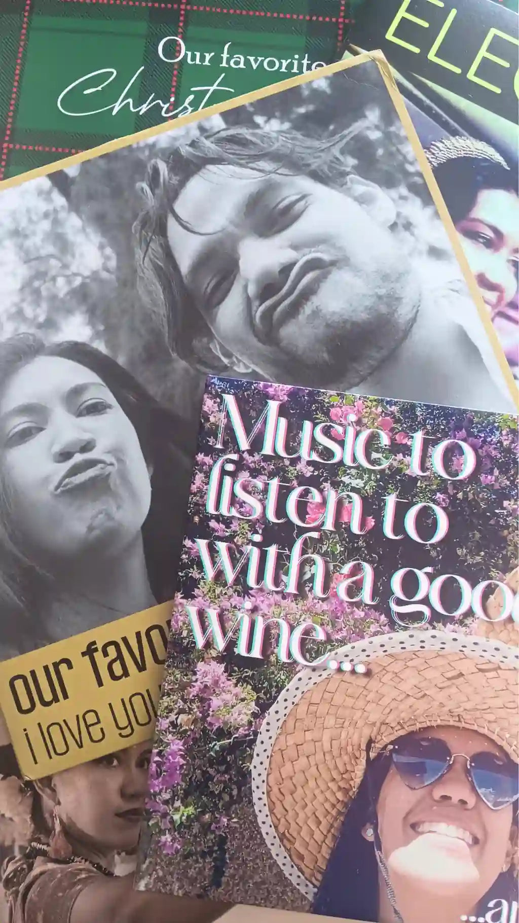 Stack of finished custom vinyl record jackets with personalized photos, representing short run vinyl pressing samples for rush orders and urgent deadlines.