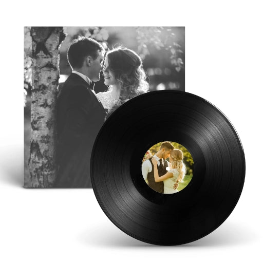 A complete 12-inch vinyl record set including a custom photo jacket and a playable disc for wedding songs and guest voices.